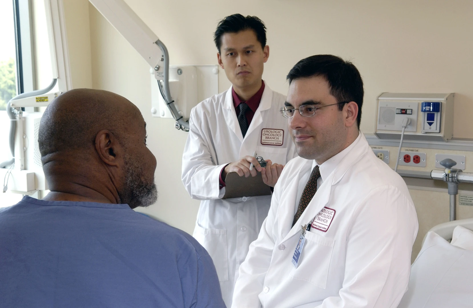 Doctor consulting with an adult patient